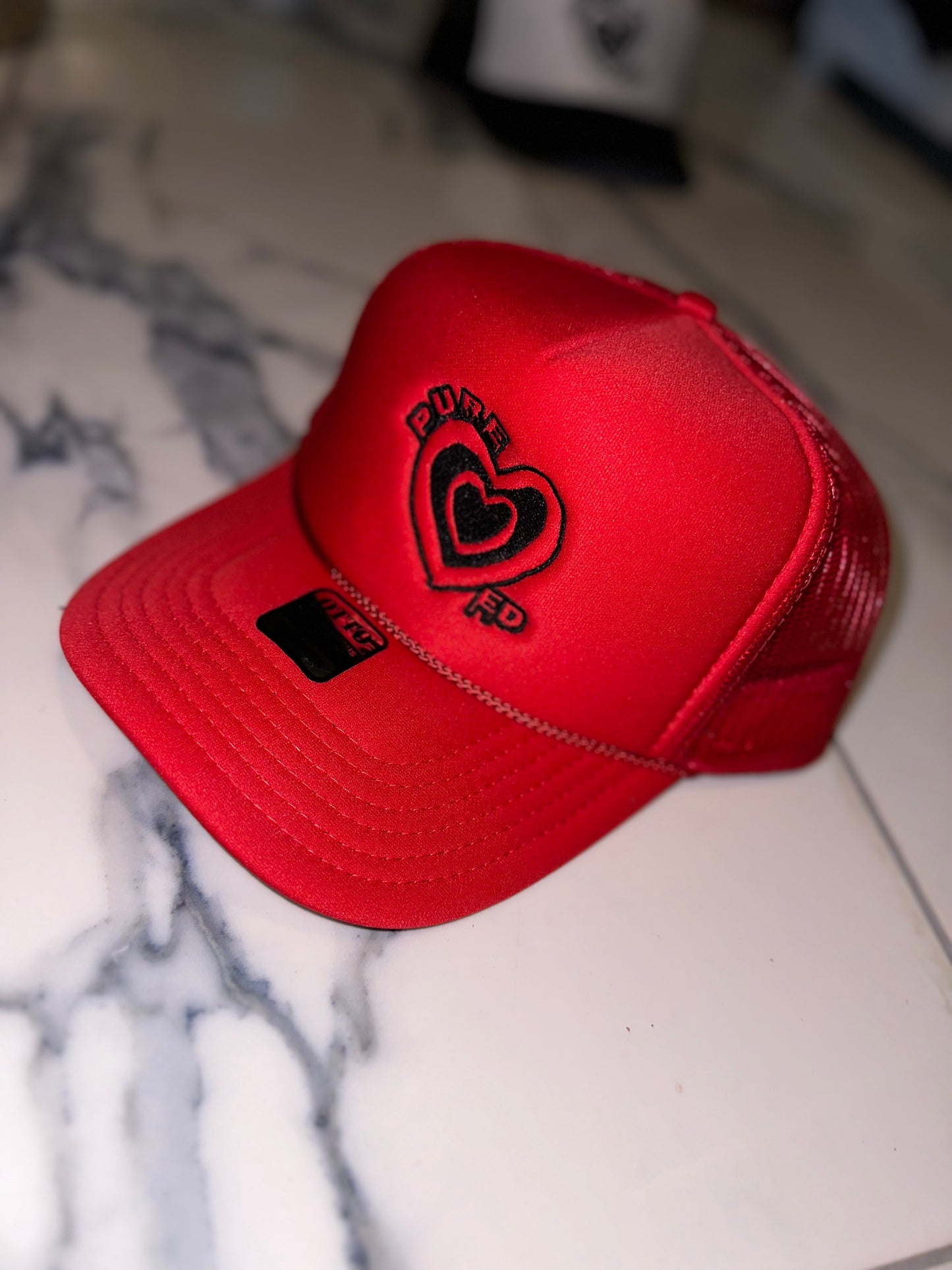 Pure Hearted Trucker Hats